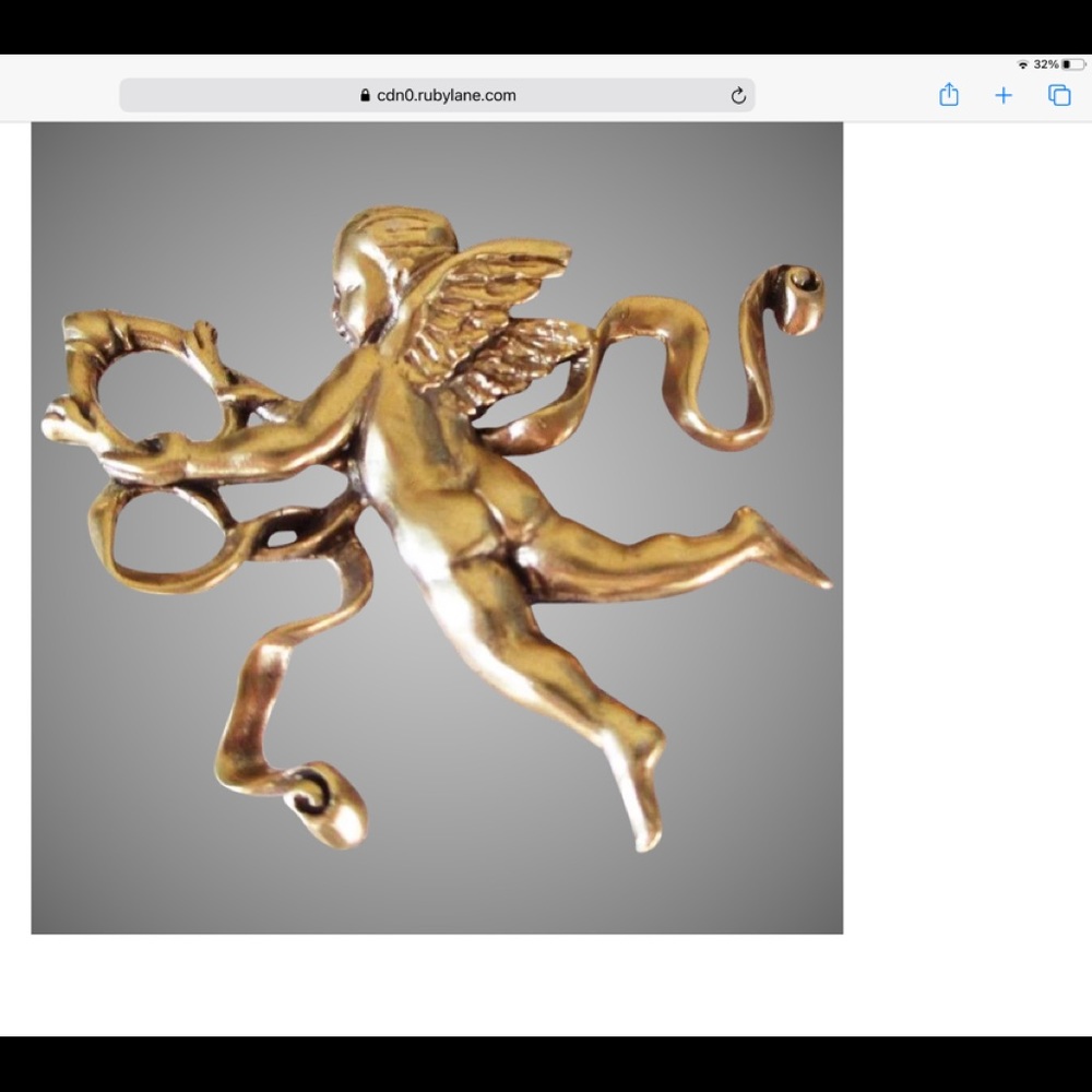 Vintage Metropolitan Museum of Art cherub pin